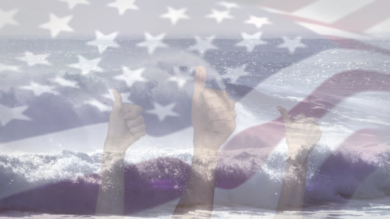 Digital composition of waving us flag over hands showing thumbs up against waves in the sea