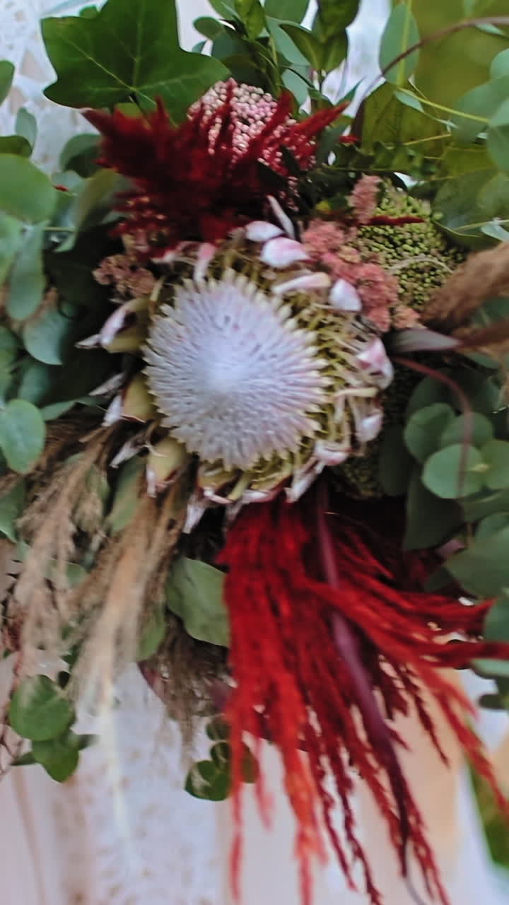Wedding bouquet in bride hands. Bride bouquet in the hands of the bride