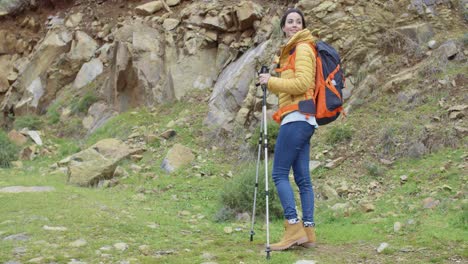 active fit young woman on a hiking trail