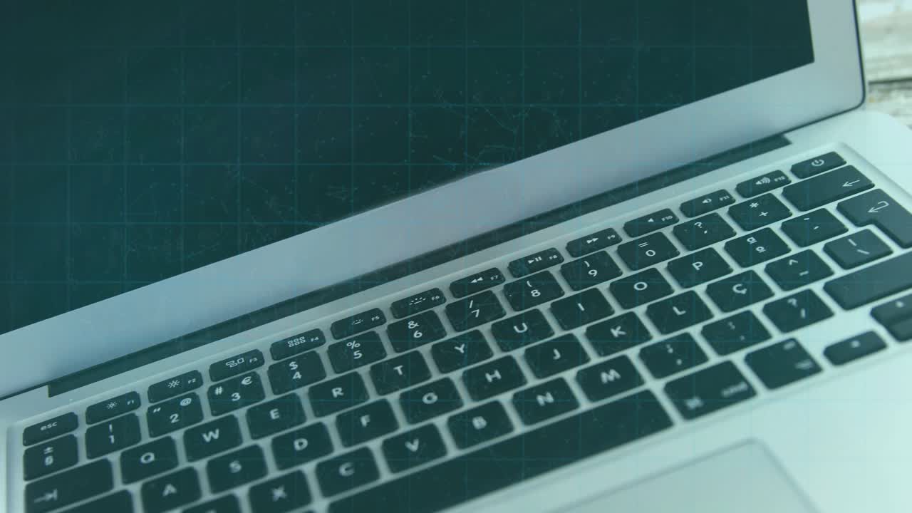 Circuitry fading over laptop trackpad for safety fingerprint pulsing and padlock moving to red mug