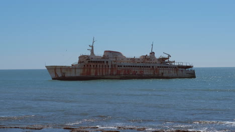 Shipwreck-closeup-handheld,-in-Morocco