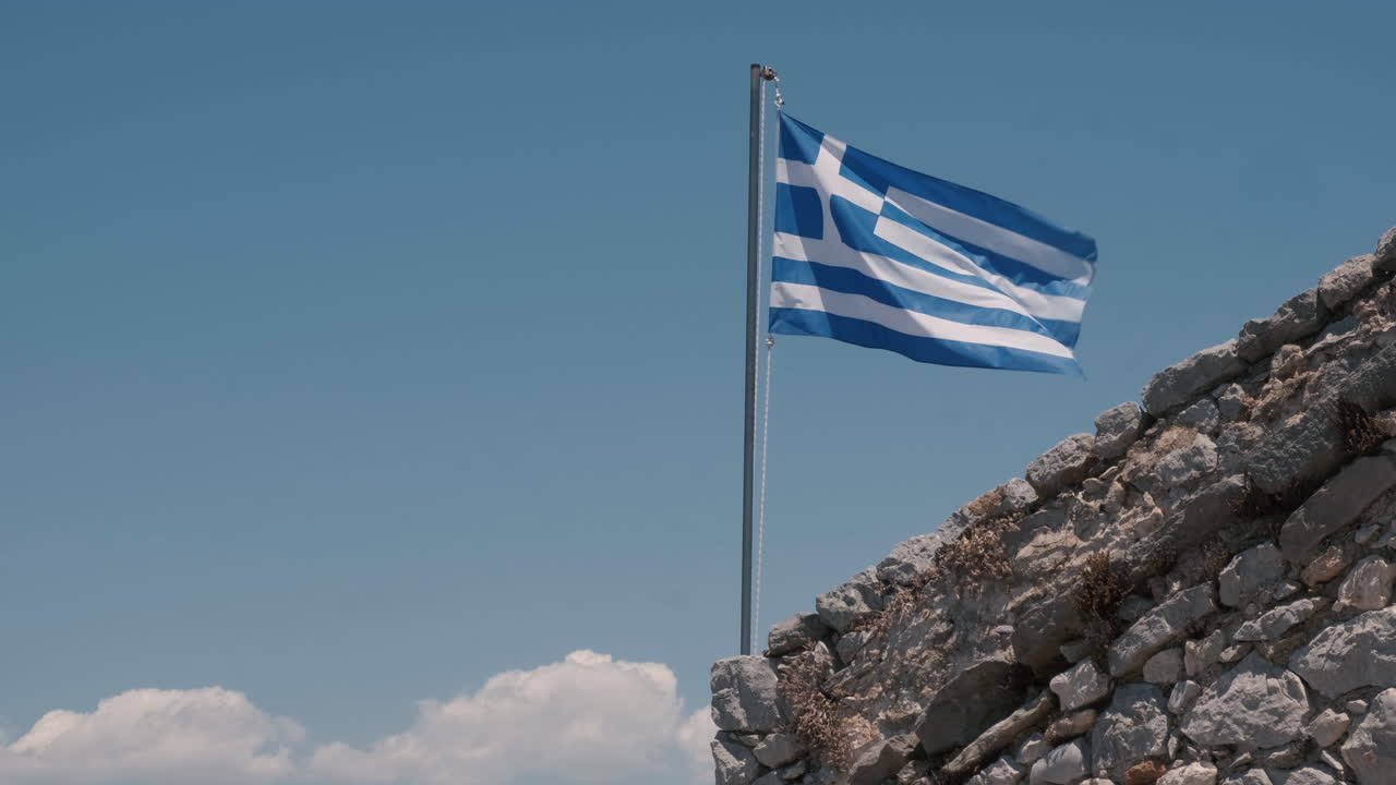 Flag of Greece Blowing on Hilltop in Slow Motion