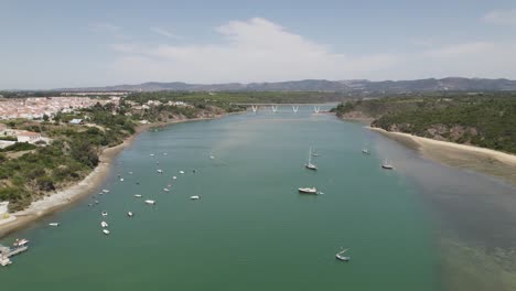 southwest coast landscpe, aerial view of mira river in vila nova de milfontes, travel destination