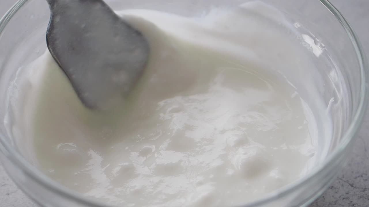 Mixing Yogurt in a Bowl