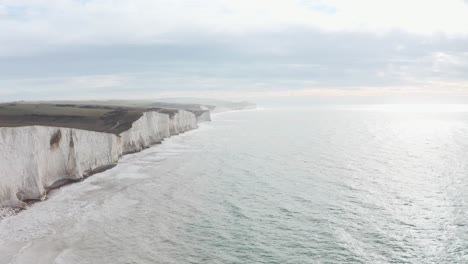 drone shot along beautiful white chalk cliffs south england