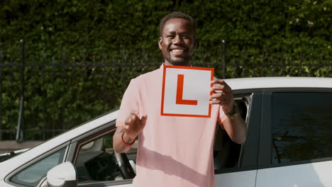 man with licensed plate