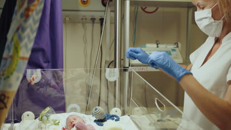 newborn baby in incubator