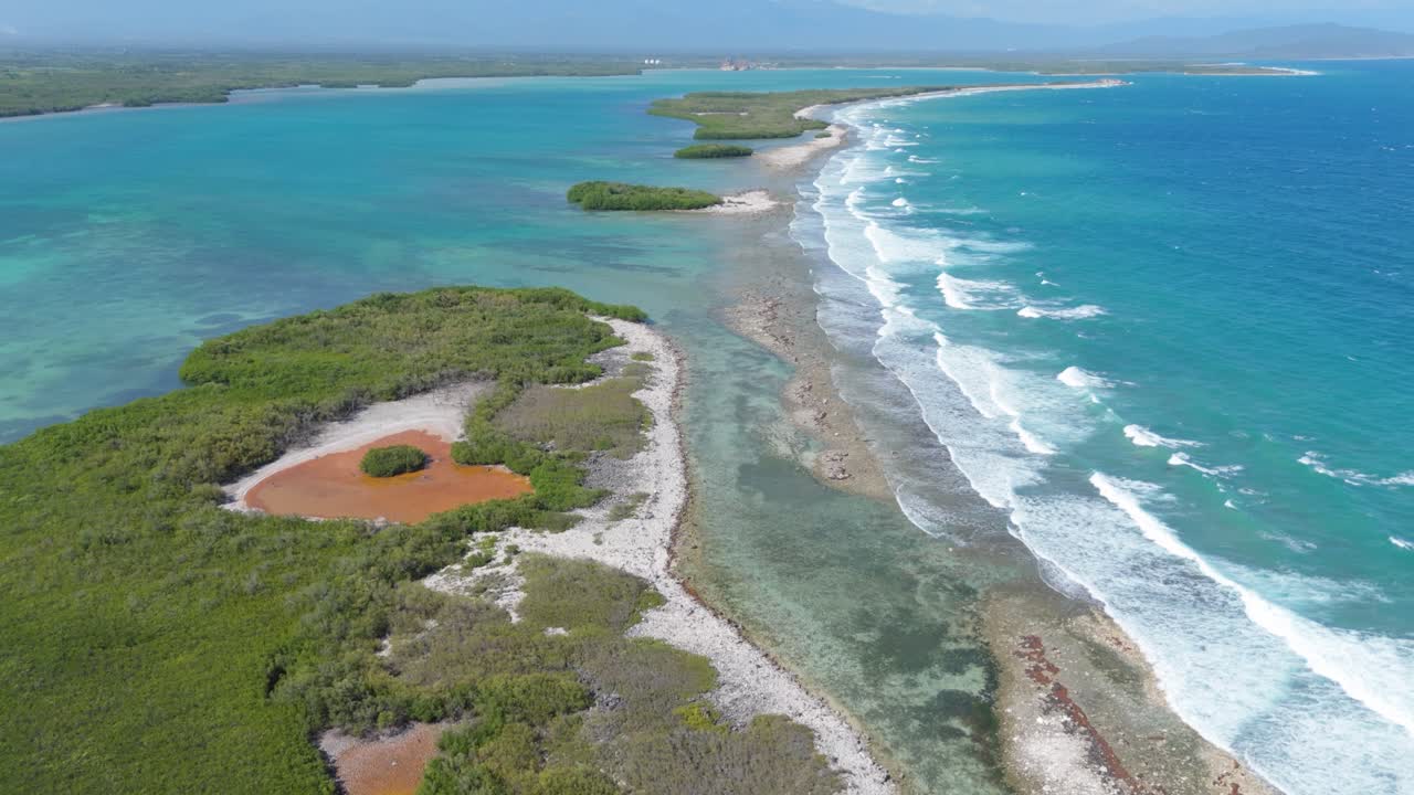 Playa Caobita, lagoon, protective reef, Caribbean travel, Azua, Dominican Republic. Aerial forward
