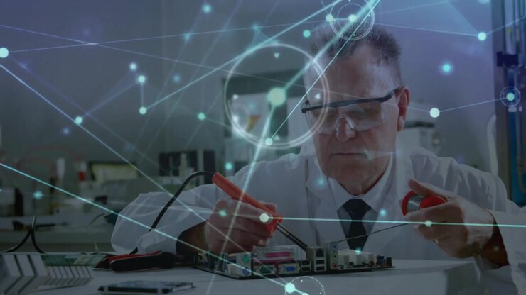 Senior electronics tech placing probes on board testing circuit starting network overlay with paths