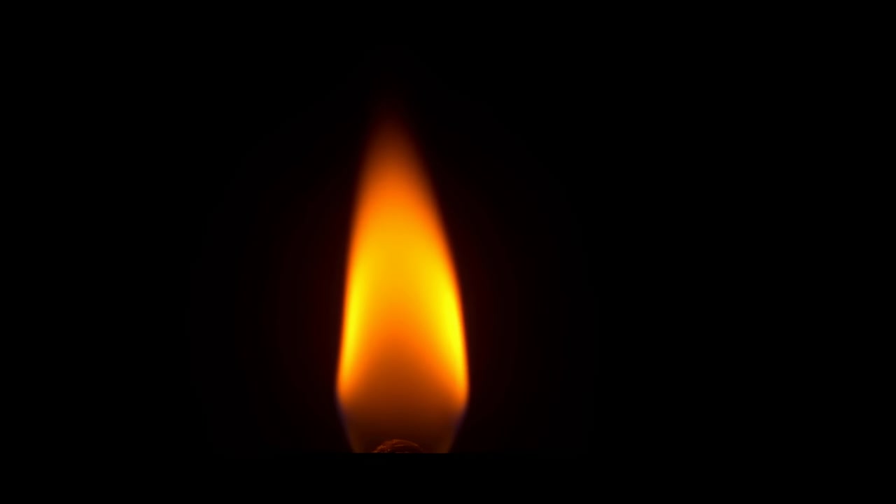 Single candle flame centered on black background, showing bright orange glow, soft blue core, gentle flicker, warm contrast, calm atmosphere and solitary spiritual mood, with flame, candle, fire