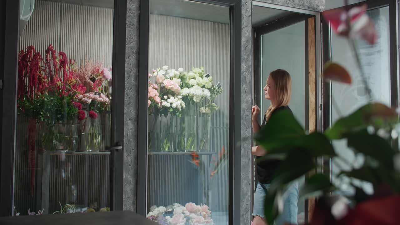Florist Arranging Flowers in a Shop