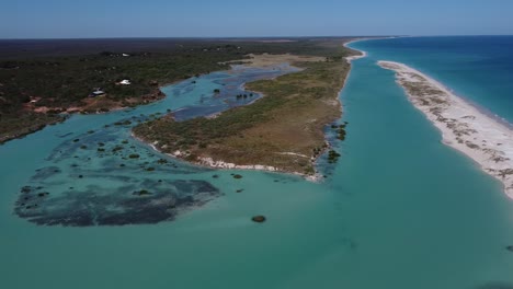 coconut well beach, located next to broome in western australia, is home to a turquoise tidal lagoon and hundreds of bathtub-sized rockpools