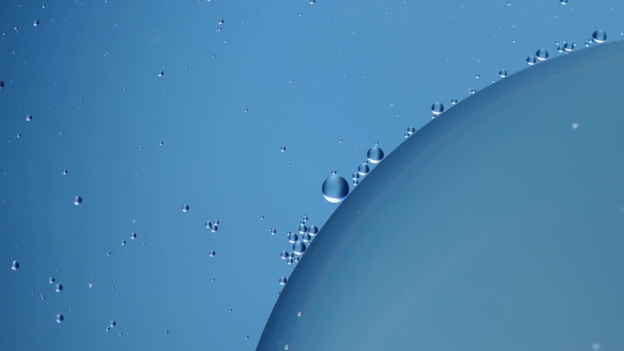 물 위에 기름이 거리는 것, 추상화 비디오, 매크로