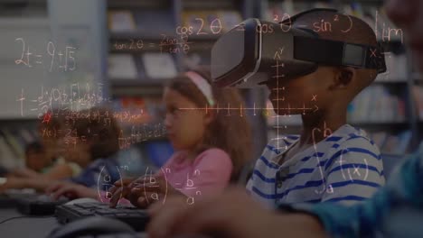 mathematical equations floating against african american boy wearing vr headset at elementary school