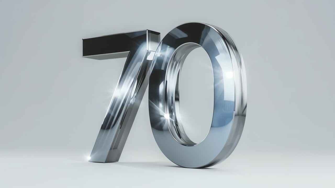 Shifting camera and moving lights sending glints across chrome numeral 70 on pale gray studio floor