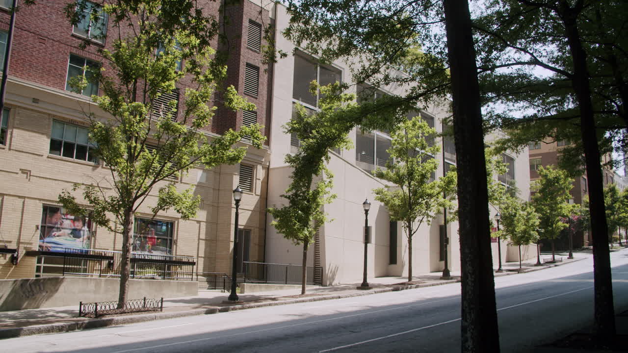City Street Scene with Parking Garage and Trees