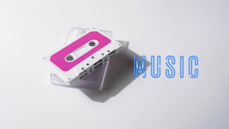 animation of music text over tape on white background