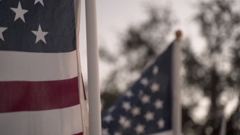 american flag with slow motion white airplane flying in the cloudy blue sky