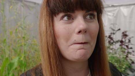 woman tastes mediterranean wild herbs