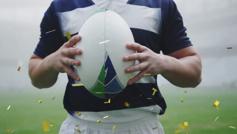 animation of confetti falling over midsection of caucasian male rugby player