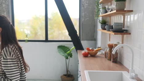 woman cooking in modern kitchen