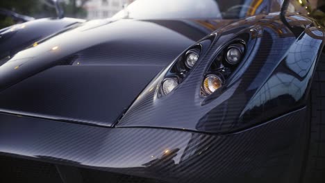 italian full carbon sport car front detail in the dark-1