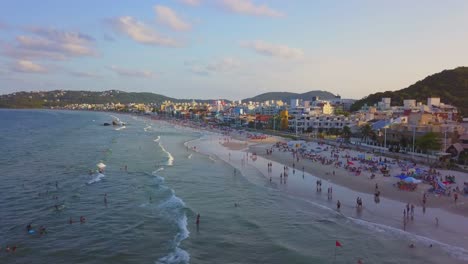 Aerial-jib-up-shot-revealing-Bombas-town-on-the-south-of-Brazil-at-golden-hour