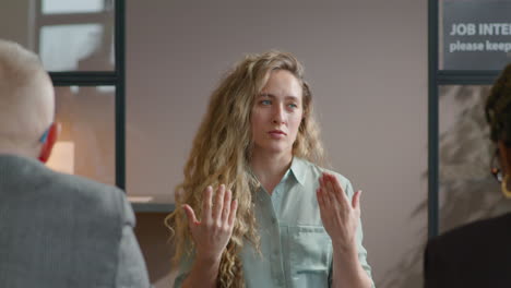 woman introducing herself to recruiting team on job interview