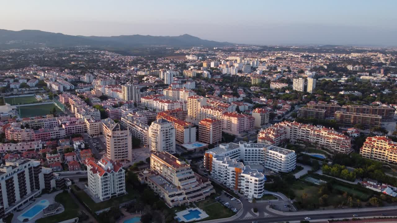Ascending Fly-By of a Residential Area by the Coast in Cascais, Portugal