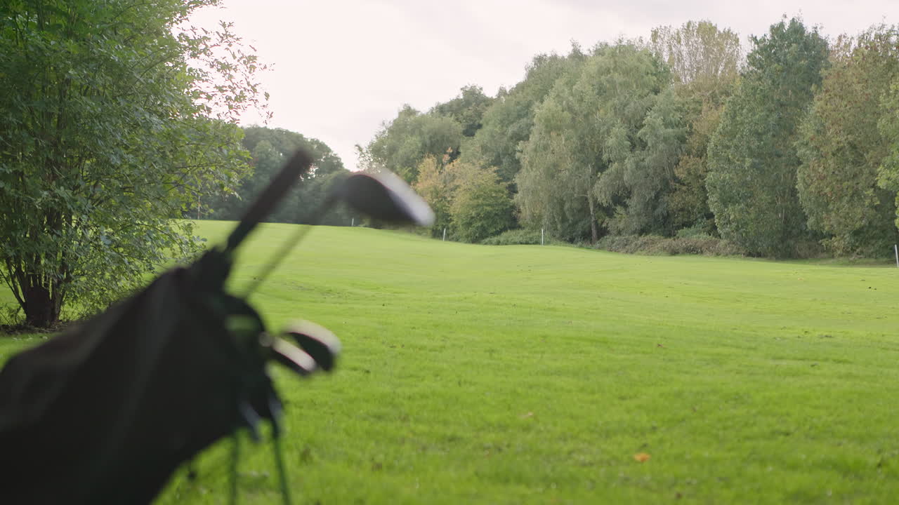 Golf Course Landscape with Golf Clubs