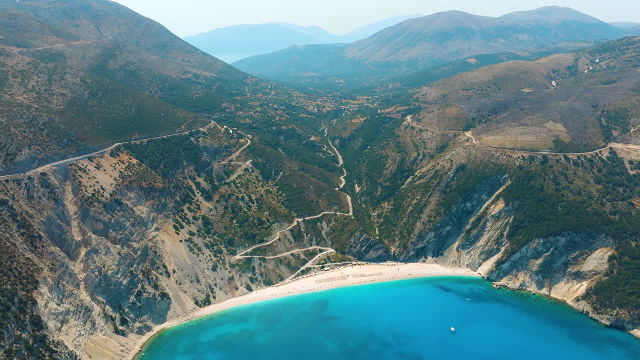Aerial View of a Stunning Beach and Mountains