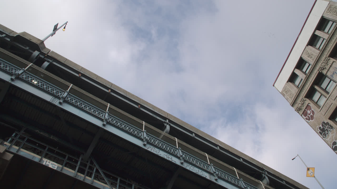Wide angle view looking up at the Manhattan Bridge