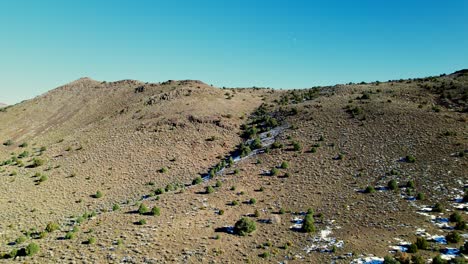 aerial view over desert landscape in mount washington nevada, sunny