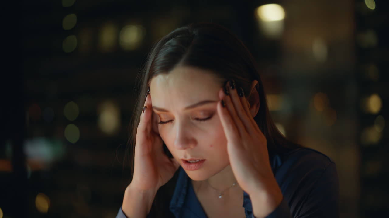 Mad businesswoman yelling cellphone at night office closeup. Angry lady shouting