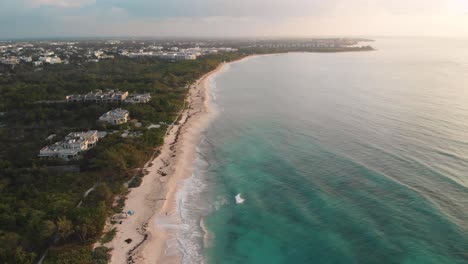 playa del carmen sandy beach with tropical sea on the coast of mexico, aerial cinematic view