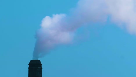 smoke from a chimney pipe - air pollution