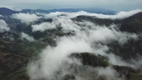 aerial view morning mist fog over los angeles neighborhood over clouds showing mountains in the di aerial view morning mist fog over los angeles neighborhood over clouds showing mountains in the distance