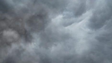 dark-blue-clouds-full-of-lightning-strikes