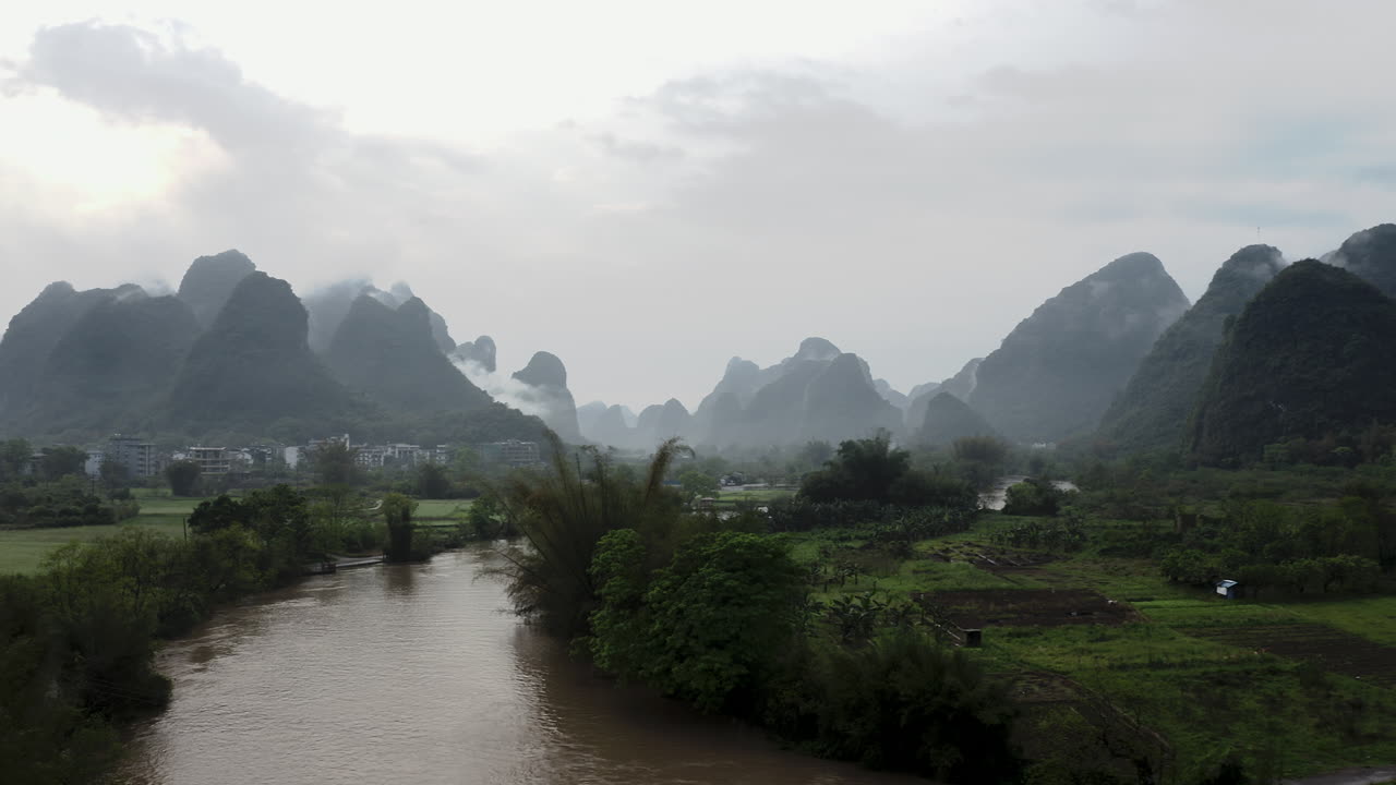 Chinese Yulong river and agricultural farmland in remote countryside