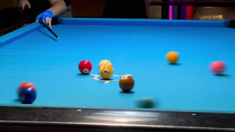 breaking at a game of 9 ball of billiard