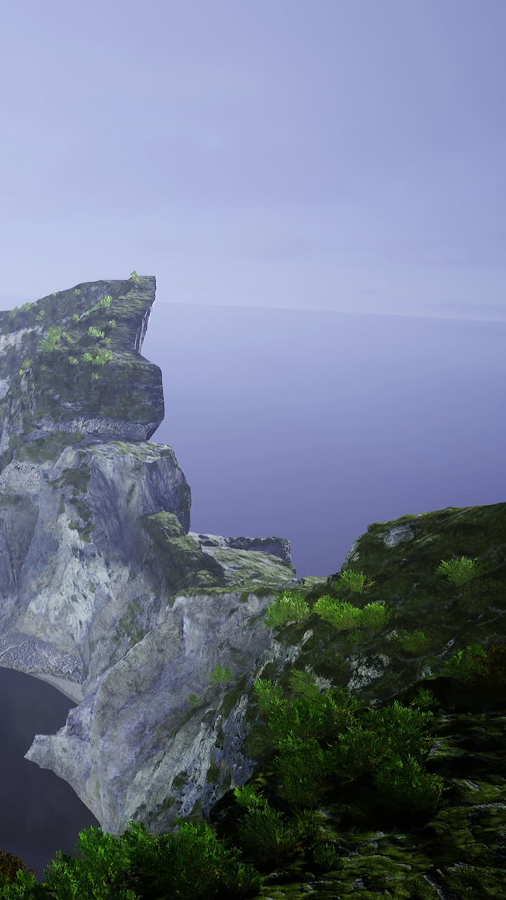 Majestic cliffs rise above calm waters under a softly glowing sky