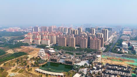 aerial view of high-rise buildings in zhouzhi county, shaanxi province, china, showcasing the urban settlement known as the world's kiwi capital.
