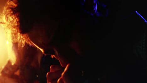 couple playing guitar and harmonica 4k
