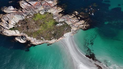 top down view of bicheno island and the azure ocean waters of tasmania, australia