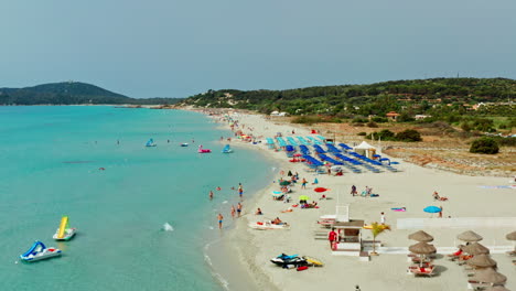 flying low over villasimius beach in sardinia, italy