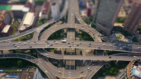 sunny day shanghai city famous traffic round road junction aerial panorama 4k tilt shift china