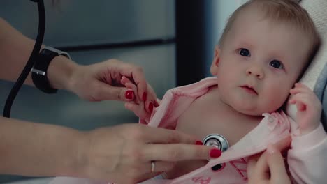 litlle baby check by stethoscope