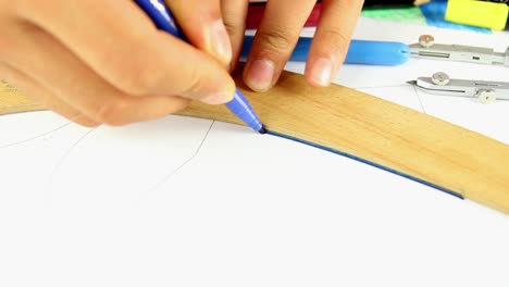 architect student drawing ruler compasses