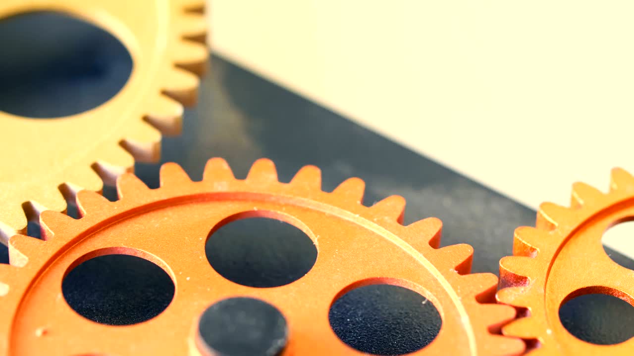 ruedas del reloj girando lentamente: proceso, progreso, idea- macro