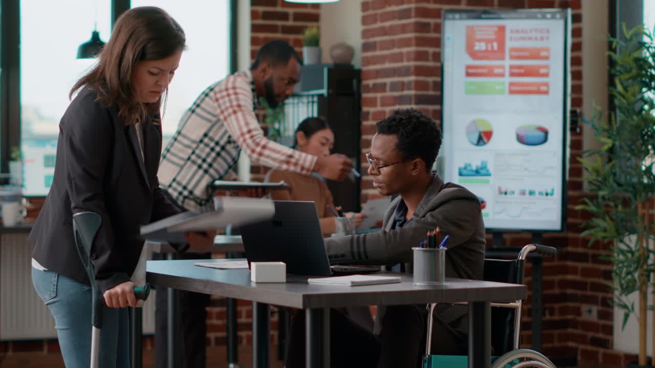 Man and woman discussing about business charts statistics